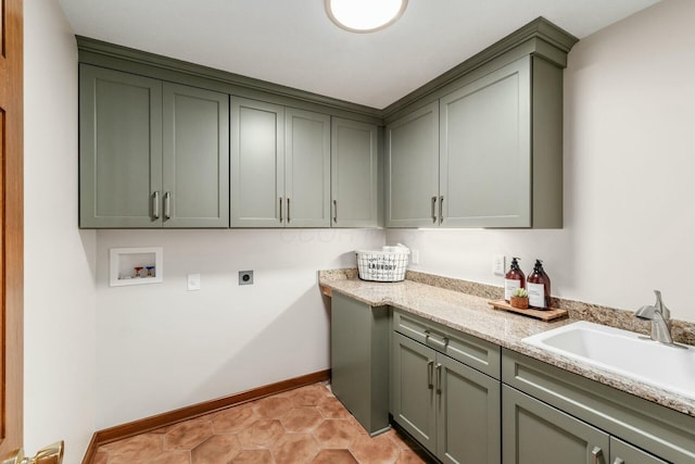 washroom with cabinets, hookup for a washing machine, electric dryer hookup, and sink