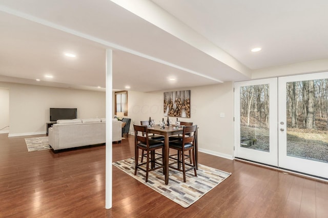 dining area featuring dark hardwood / wood-style flooring and french doors