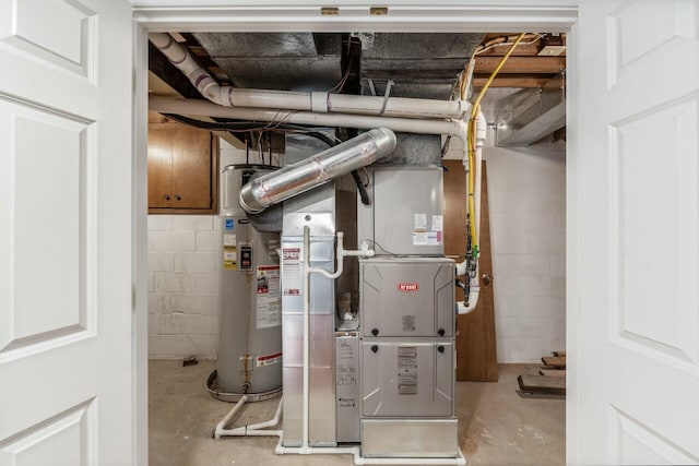 utility room featuring gas water heater