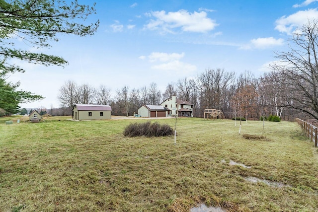 view of yard with an outdoor structure