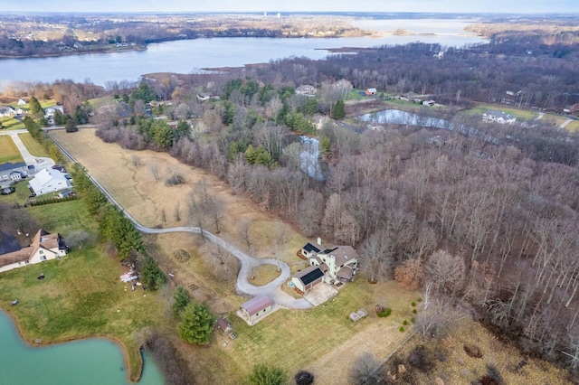 drone / aerial view with a water view