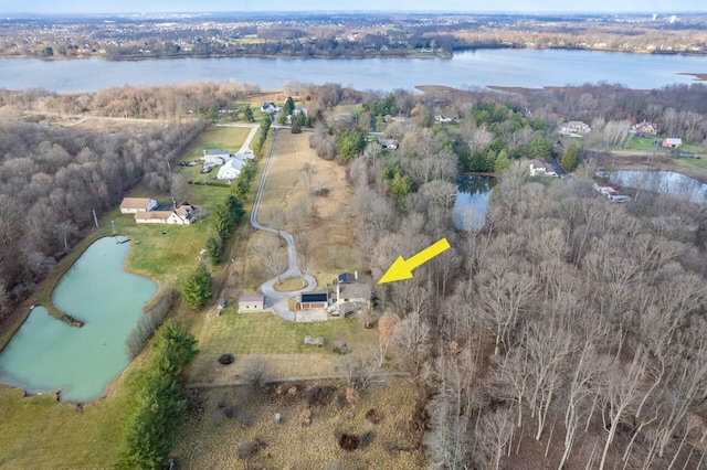 birds eye view of property featuring a water view