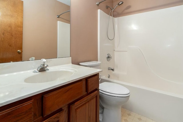 full bathroom featuring vanity, bathtub / shower combination, and toilet