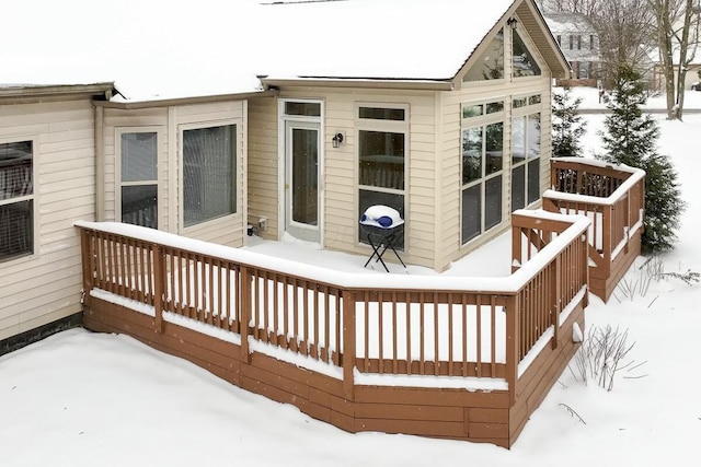 view of snow covered deck