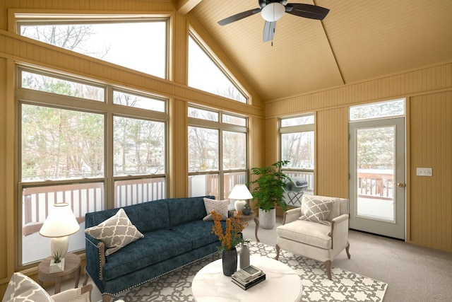 sunroom featuring ceiling fan and lofted ceiling