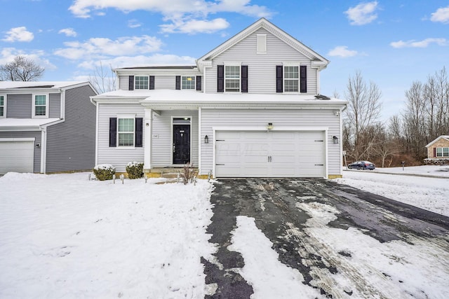 view of front property with a garage