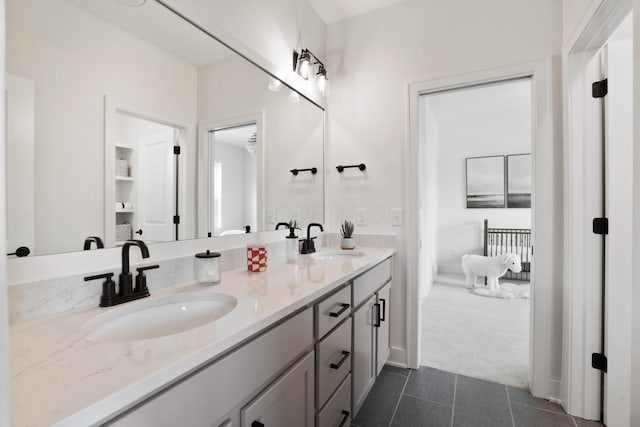 bathroom featuring tile patterned floors and vanity