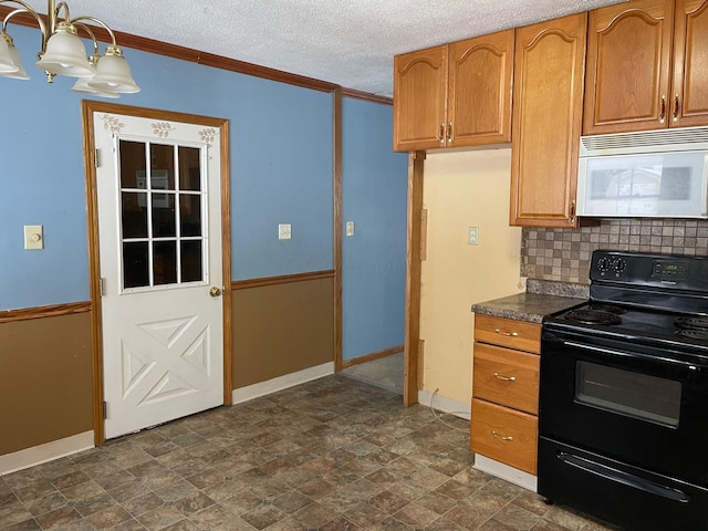 kitchen with a textured ceiling, backsplash, black range with electric stovetop, and crown molding