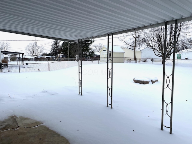 view of yard covered in snow