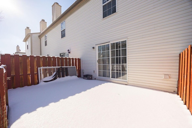 view of snow covered property