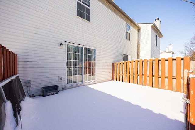 view of snow covered patio