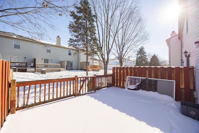 view of snow covered deck