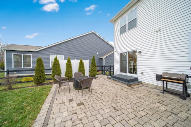 view of patio with a grill