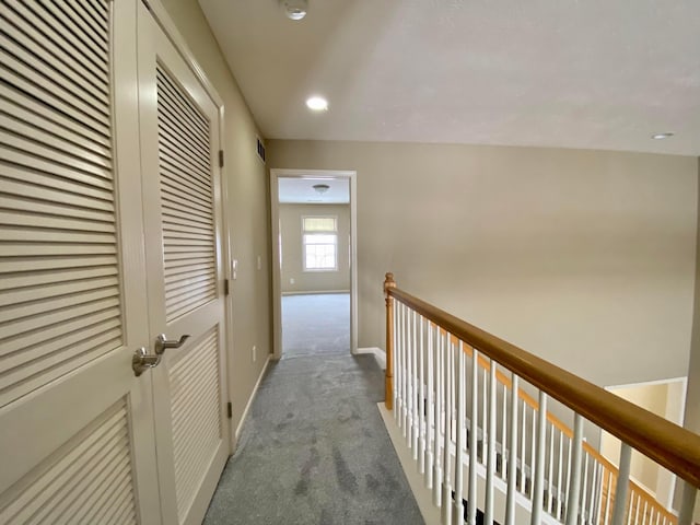 corridor with carpet floors