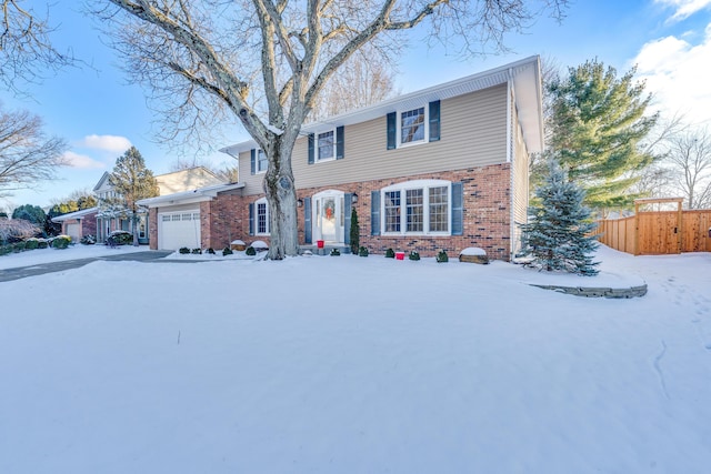 view of front of property featuring a garage