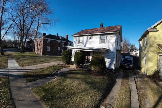 view of front of home with a front lawn