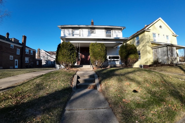 view of front facade featuring a front lawn