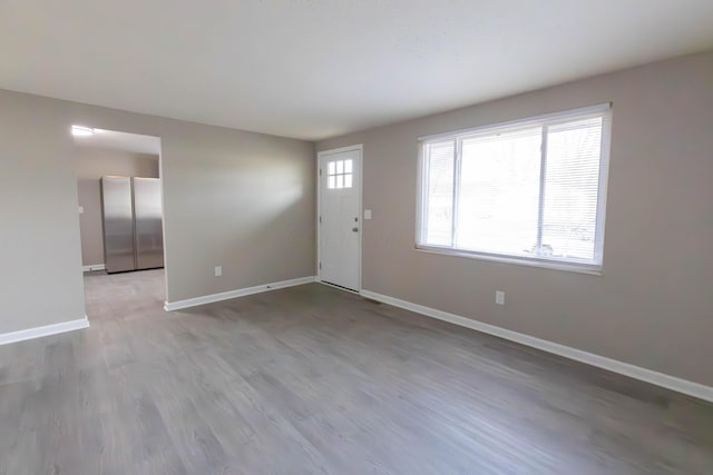 foyer with light wood-type flooring