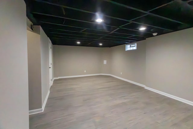 basement featuring hardwood / wood-style flooring