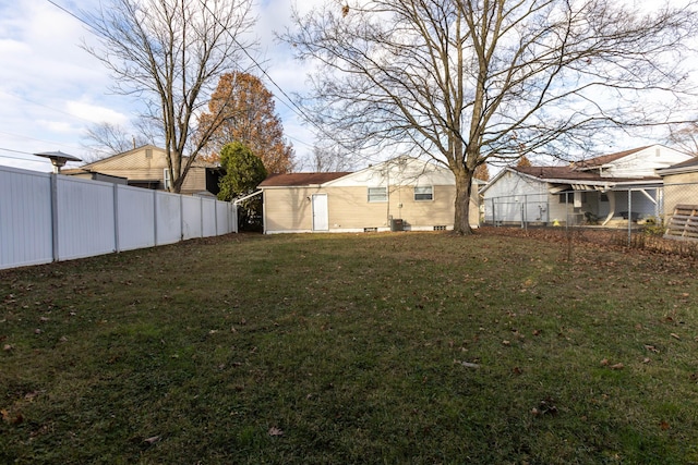 view of yard featuring a storage unit