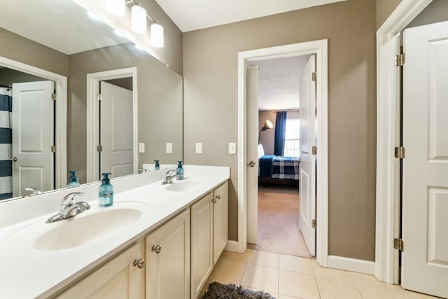 bathroom with vanity and tile patterned floors