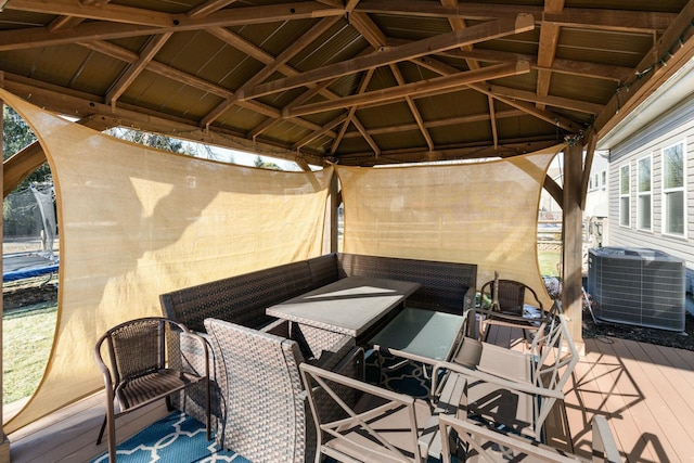 deck with a gazebo and central AC unit