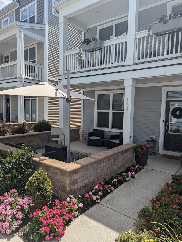 view of patio / terrace featuring a balcony