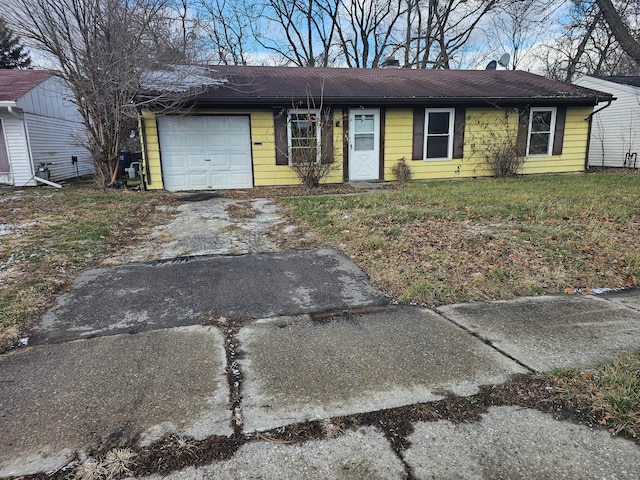 single story home with a garage