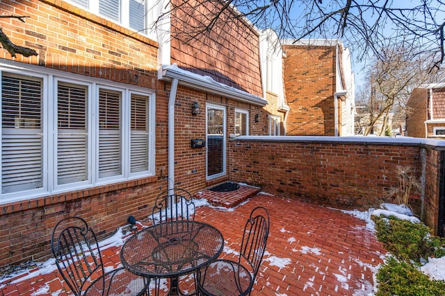 view of snow covered patio