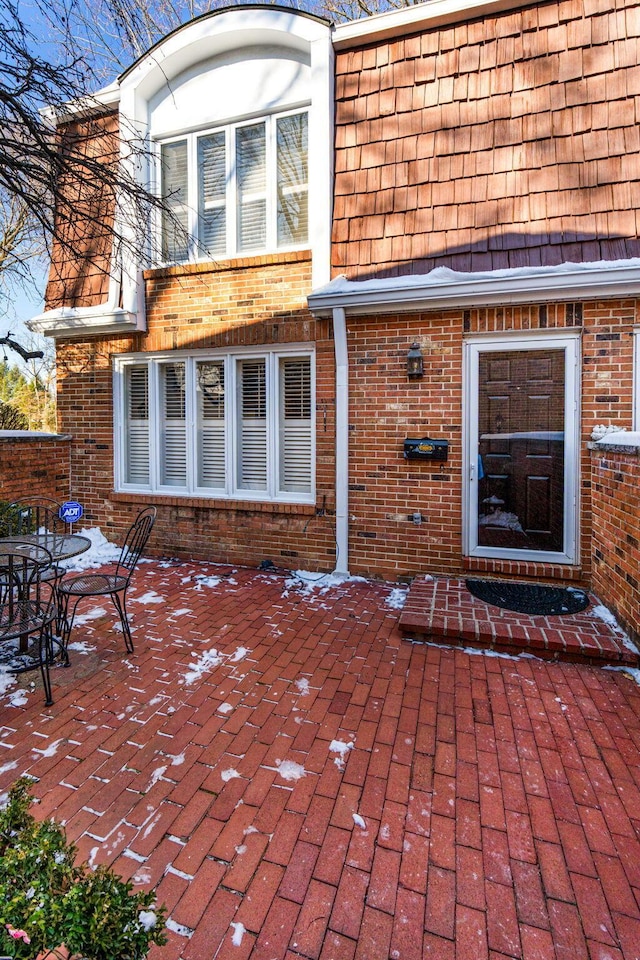 rear view of house featuring a patio