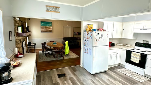 kitchen with white cabinetry, crown molding, dark hardwood / wood-style floors, and white appliances