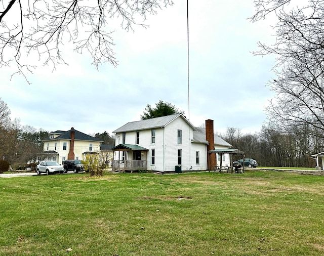 view of home's exterior featuring a yard