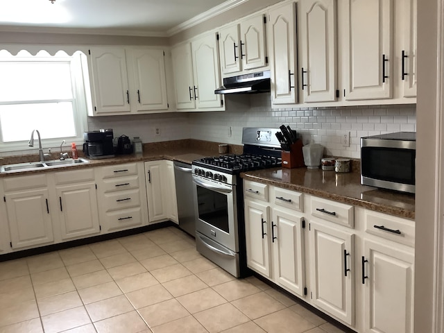 kitchen with sink, white cabinetry, and stainless steel appliances