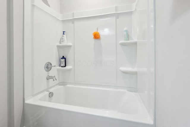 bathroom with shower / bathtub combination