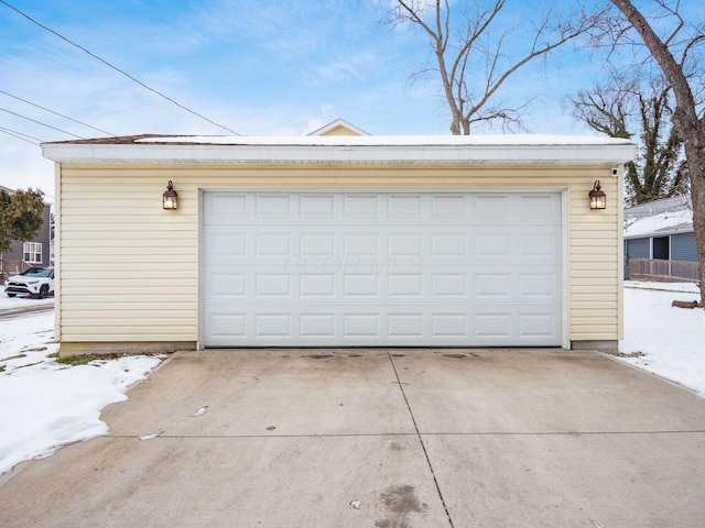 view of snow covered garage