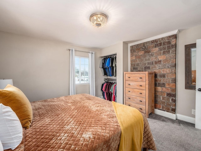 bedroom featuring a closet and carpet flooring