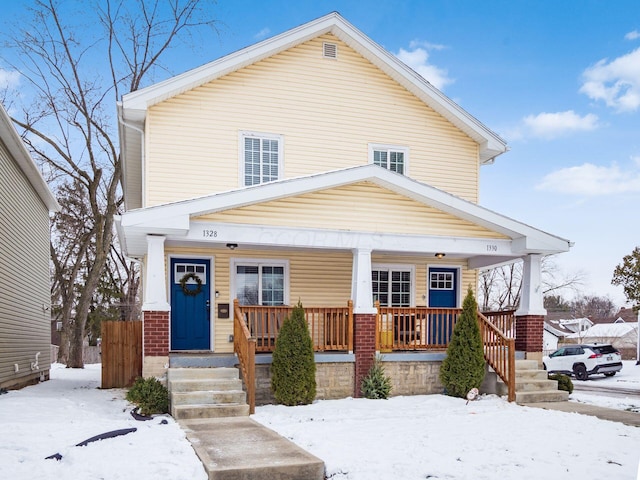 view of front of property featuring covered porch