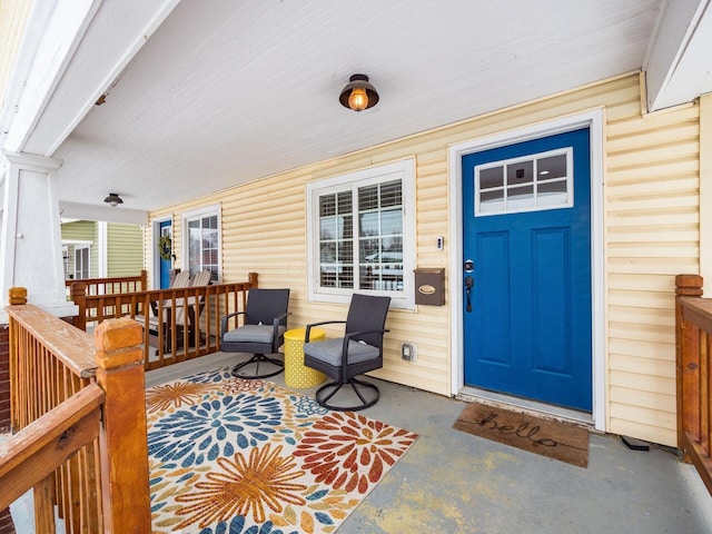 entrance to property with a porch