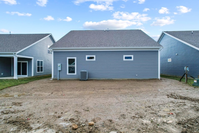 rear view of property with central air condition unit