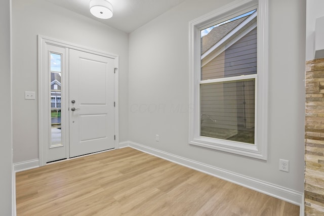 entrance foyer featuring light wood-type flooring