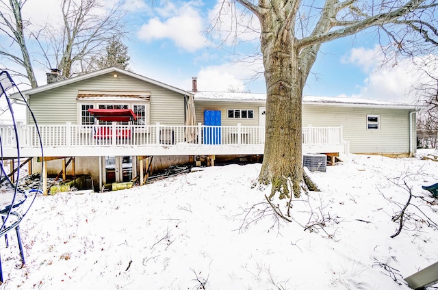 view of snow covered house