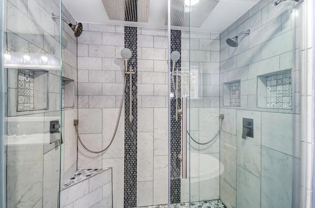 bathroom featuring an enclosed shower