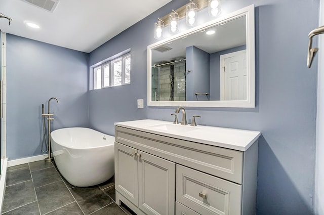 bathroom with separate shower and tub, tile patterned flooring, and vanity