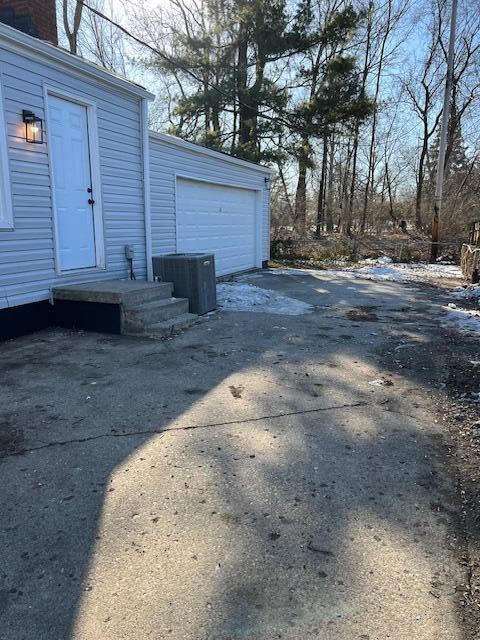 garage featuring cooling unit