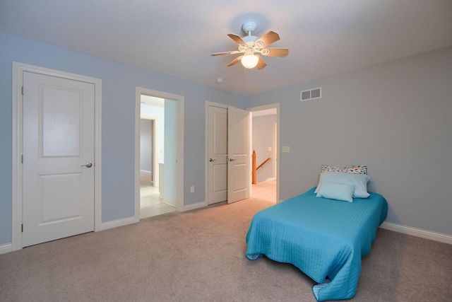 bedroom with carpet flooring and ceiling fan