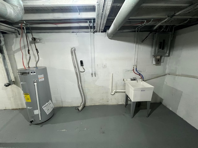 basement with sink, electric panel, and water heater