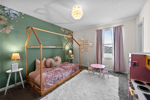 carpeted bedroom featuring a textured ceiling