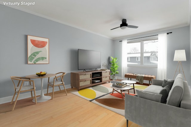 living room with ceiling fan, light hardwood / wood-style floors, and ornamental molding