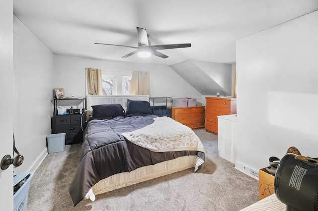 bedroom featuring ceiling fan, carpet, and vaulted ceiling