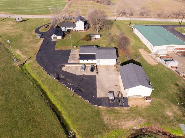 birds eye view of property featuring a rural view